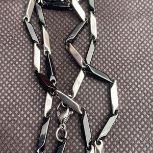 New 30” Black and silver chain.